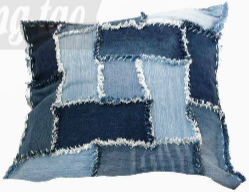 A blue patchwork pillow

Description automatically generated