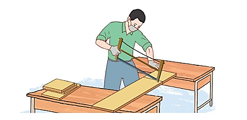 A person using a saw to cut a piece of wood

Description automatically generated