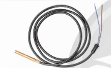 A black wire with a copper tip

Description automatically generated