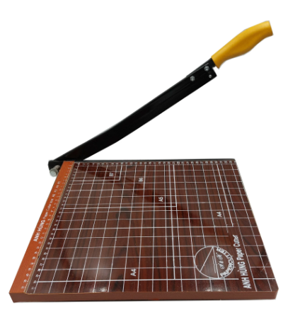 A paper cutter with a yellow handle

Description automatically generated with medium confidence